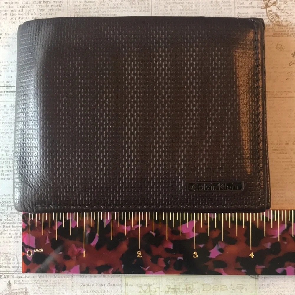 Calvin Klein Textured Leather Bi-Fold Wallet
